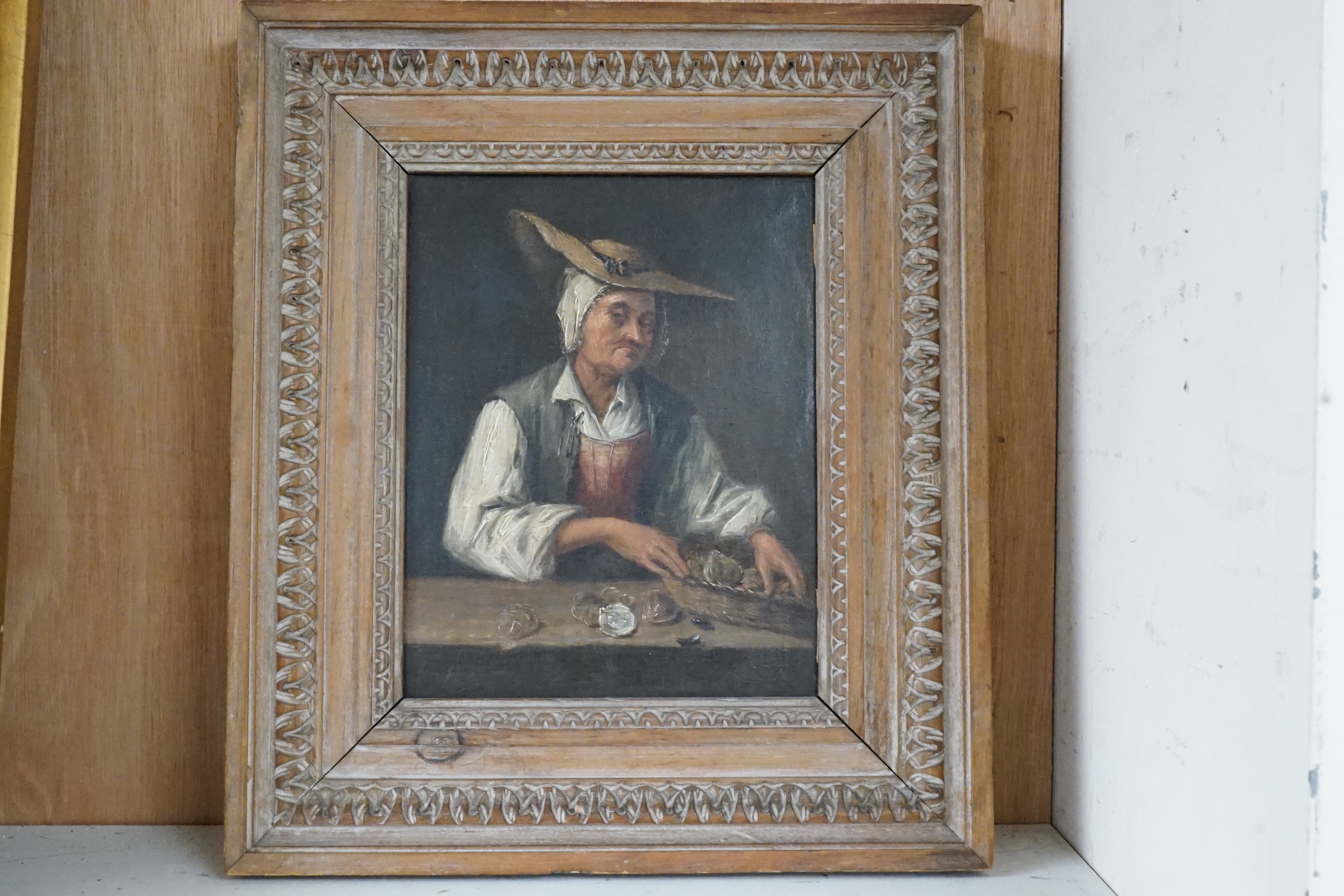Balthazar Nebot (1700-1786), oil on oak panel, 'Seated fishmaid with a basket of oysters', signed, 20 x 15.5cm